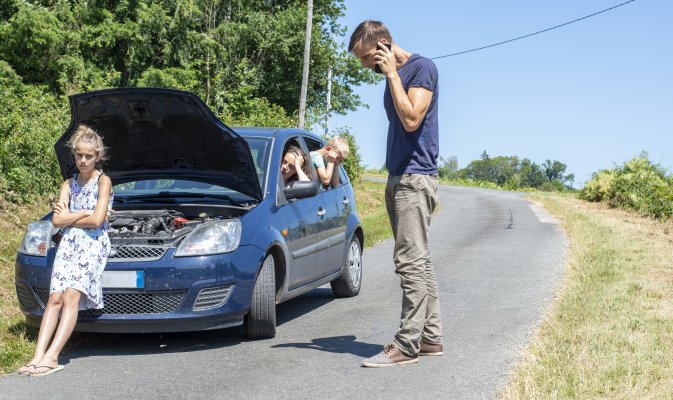 manufacturer wrap protection extended car warranty usaa car breakdown family with kids on the side of the road man on the phone